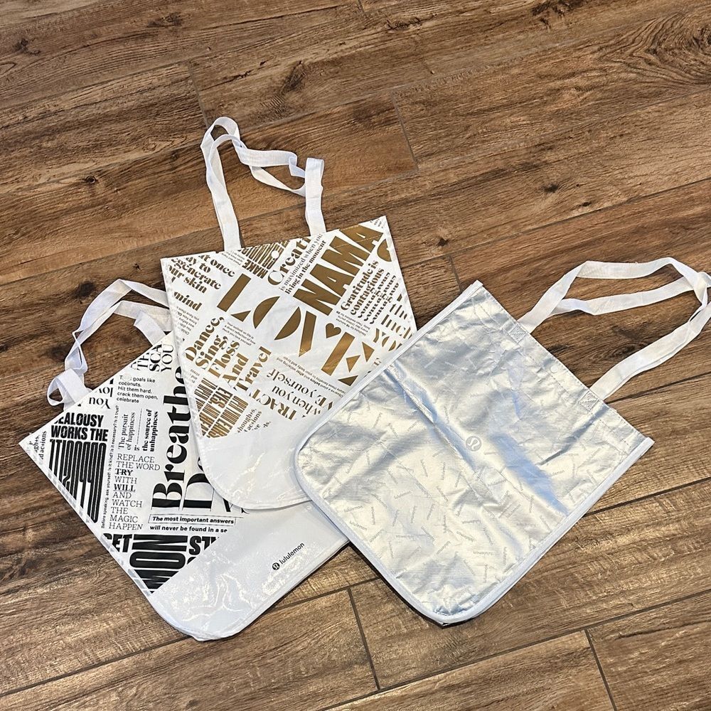 lululemon athletica White and Gold Tote Bags